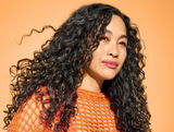 Woman with long curly hair